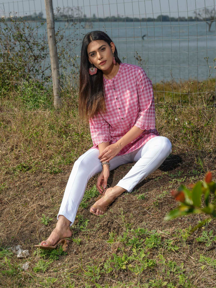 Cotton lycra checks top with cutwork embroidery at sleeves