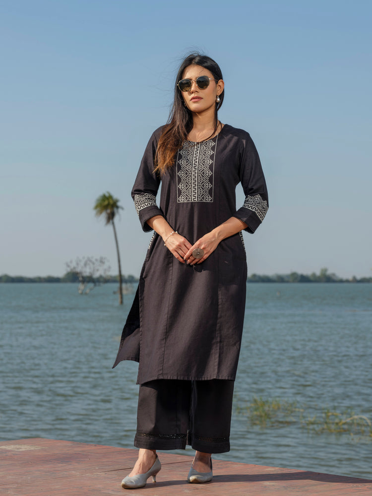 Solid Colored Monotone Kurta with Embroidery and Lace details.