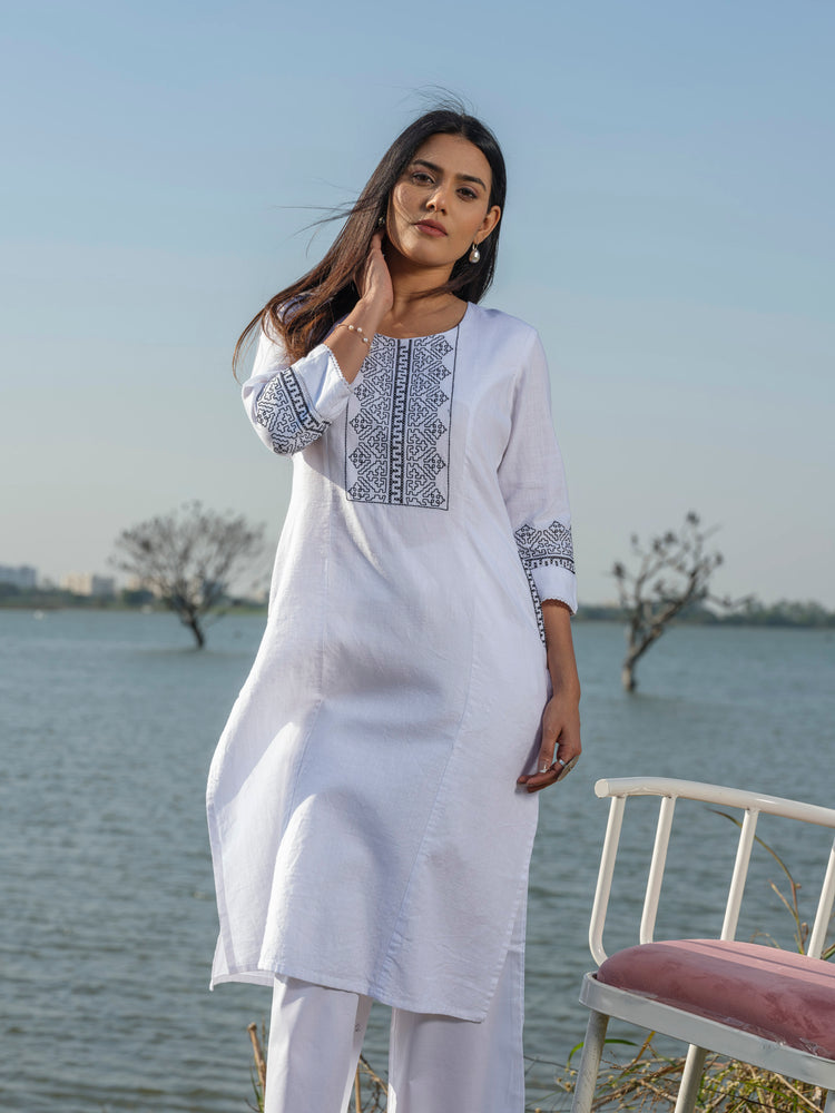 Solid Colored Monotone Kurta with Embroidery and Lace details.