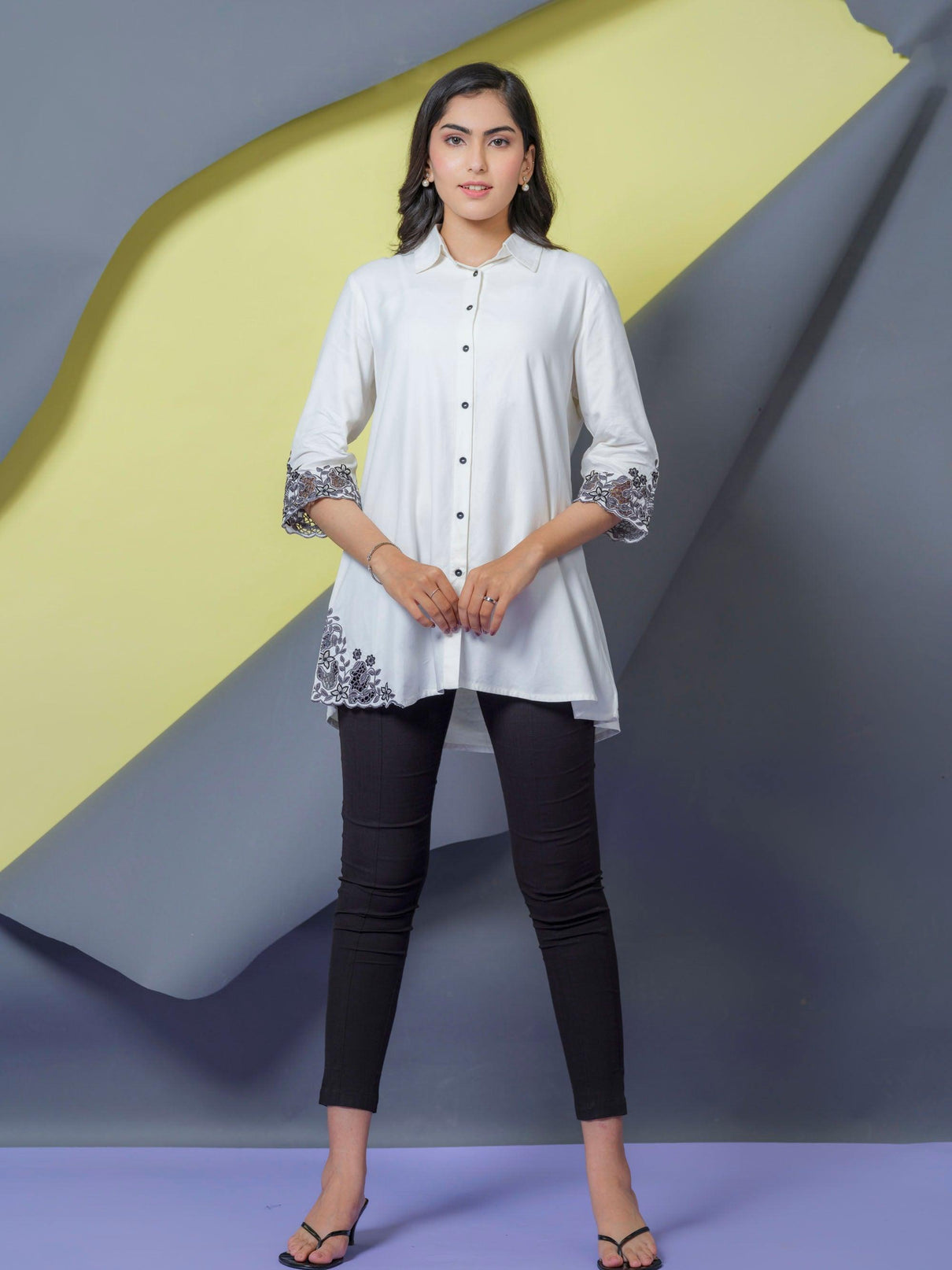 Solid Colored Top With Cutwork Embroidery in Front and Sleeves Etiquette Apparel