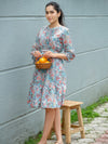 Multi color floral dress with boat neck and fryill at hem Etiquette Apparel