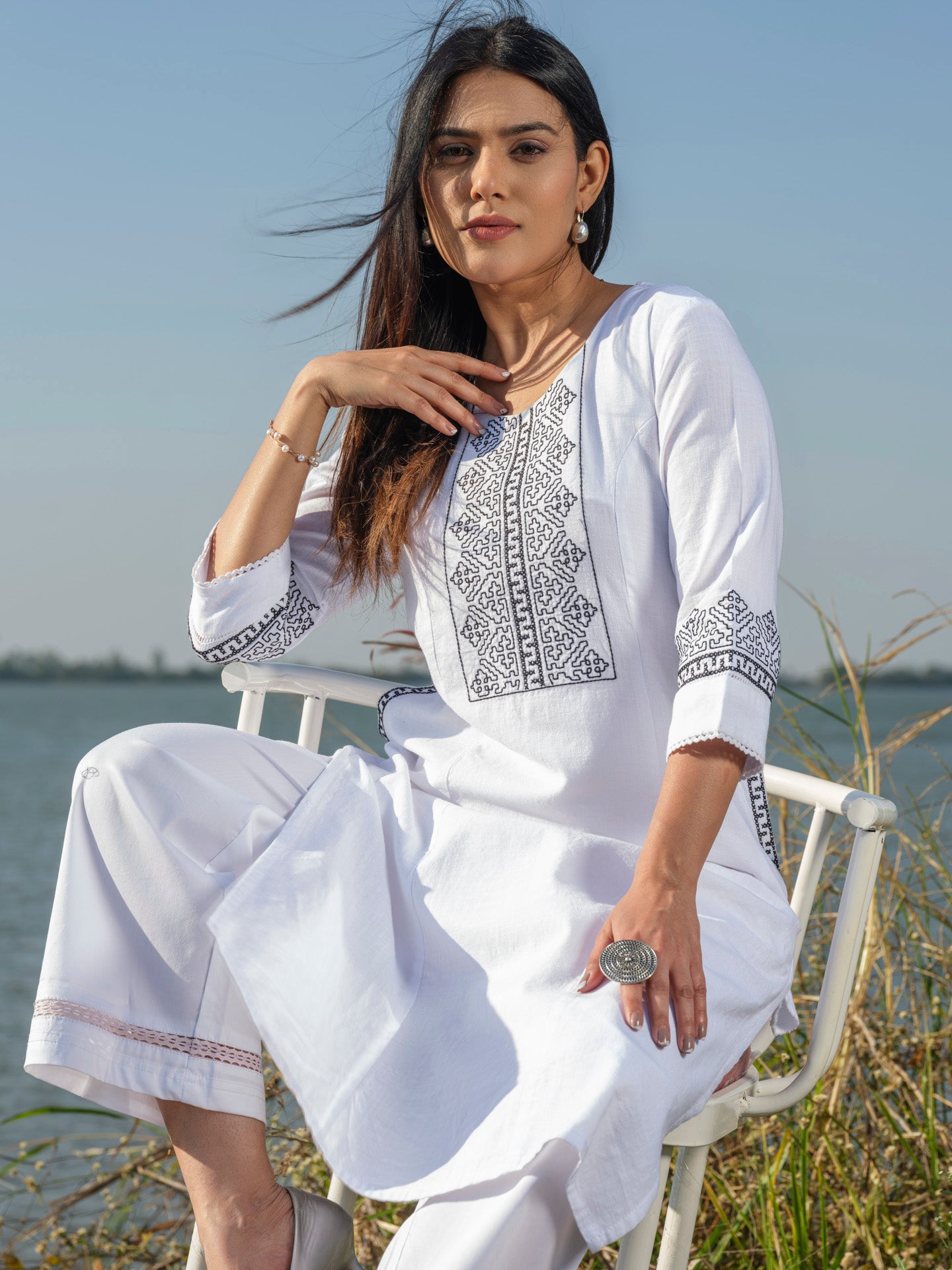 Solid Colored Monotone Kurta with Embroidery and Lace details.