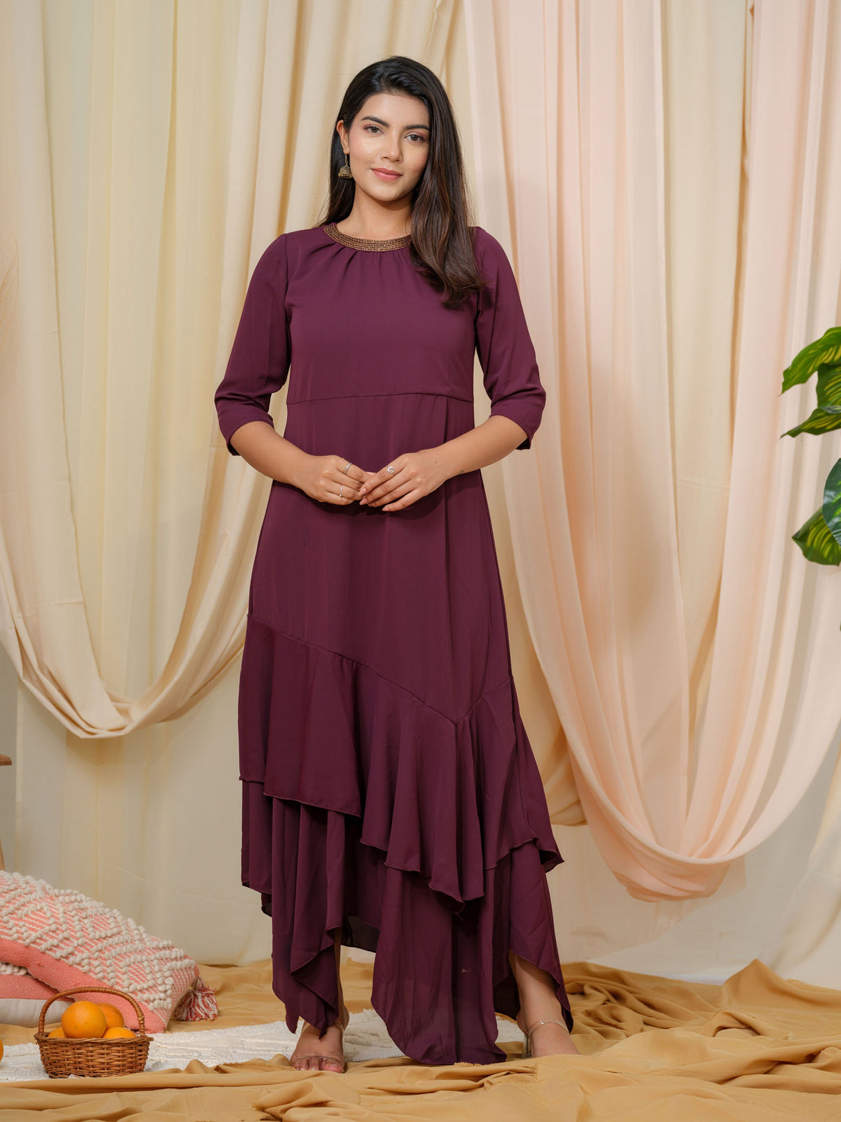 Solid colored dress highlighted with handcrafted embroidery Etiquette Apparel
