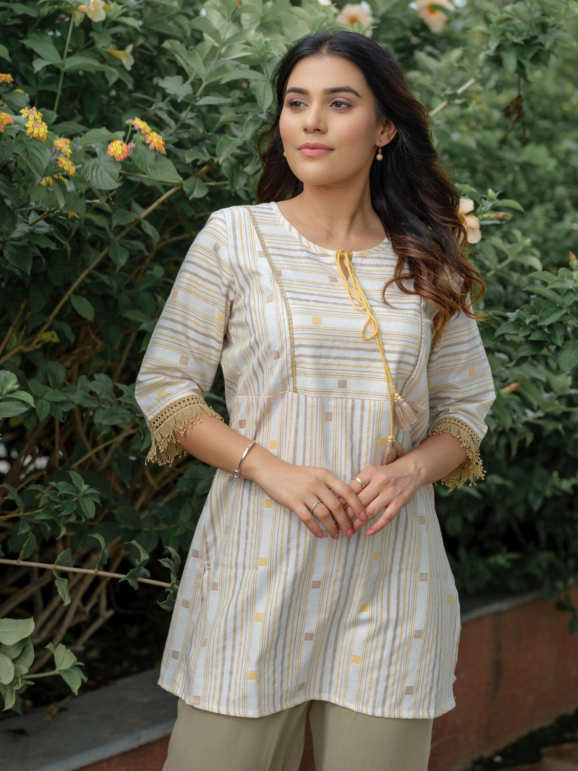 Product Carousel Image 2: Stripe Top With Lace Details at Sleeves and Hanging at Neck