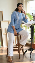 Product Carousel Image 3: Floral Whispers on Denim Top