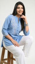 Product Carousel Image 2: Floral Whispers on Denim Top