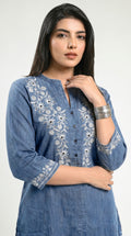 Product Carousel Image 4: Floral Whispers on Denim Top
